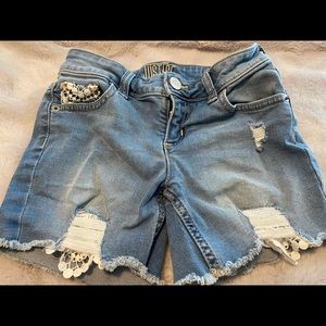 Justice distressed denim shorts, size 8